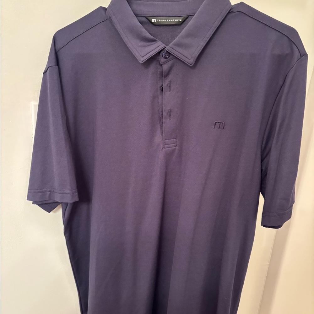 Travis Mathew Men's navy Polo Shirt